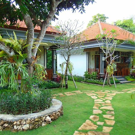 Arumanis Homestay Пекату Экстерьер фото