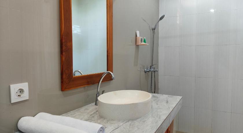 Arumanis Homestay Пекату Экстерьер фото